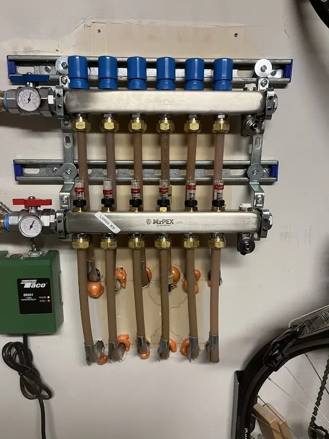 Plumber performing Leak Detection at a residential property in Hudson